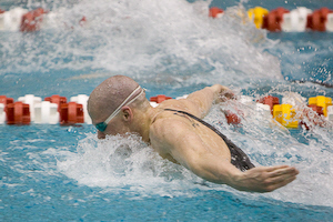 UVA's Pat Reams swims to victory in the 200 butterfly in 1:43.82