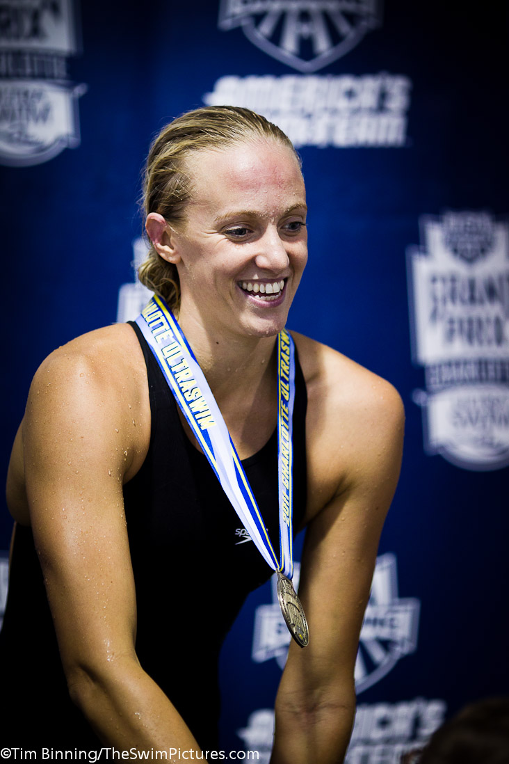 Dana Vollmer of Cal Aquatics on the medal stand following her win in the 100 butterfly championship final.