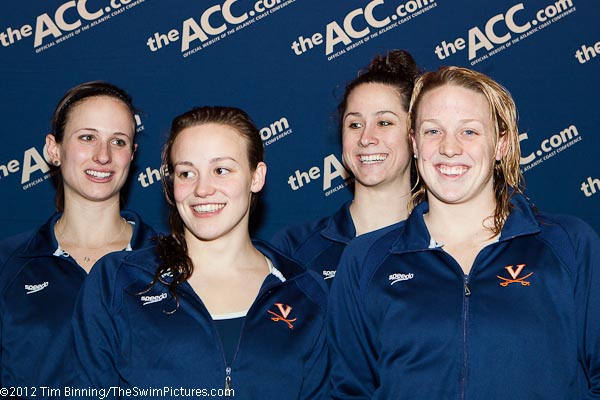 The University of Virginia team of Charlotte Clarke, Kelly Flynn, Meredith Cavalier and Lauren Perdue win the 200 medley relay on opening night of the 2012 ACC Women's Swimming and Diving Championships in Christiansburg, Virginia.