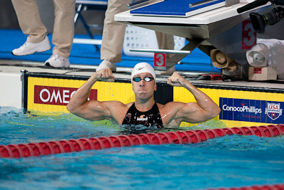 Mark Gangloff of SwimMAC sets a new American record in the 100 breaststroke at the 2009 ConocoPhillips National Swimming Championships and World Championship Trials