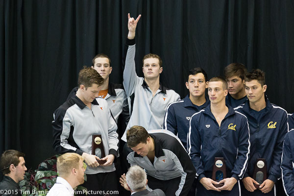 The University of the Texas 200 free relay team of Matt Ellis, John Murray, Jack Conger and Kip Darmody accept their award after winning the event at the 2015 NCAA Division I Men's Swimming and Diving Championships held at the University of Iowa.