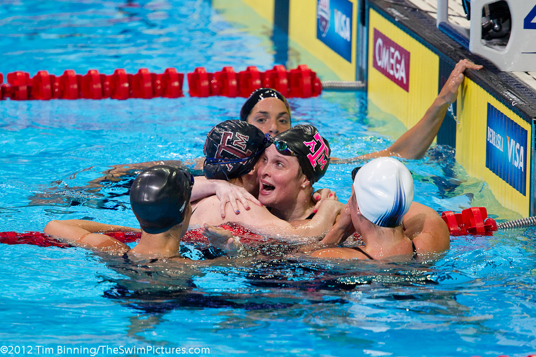 Camille Adams is congratulated by her Texas A&M teammate Caroline Mcelhany on her 200 fly win and Olympic berth. | 20, Adams, Aggie Swim Club, Cammille Adams, GU, _Adams_Cammille