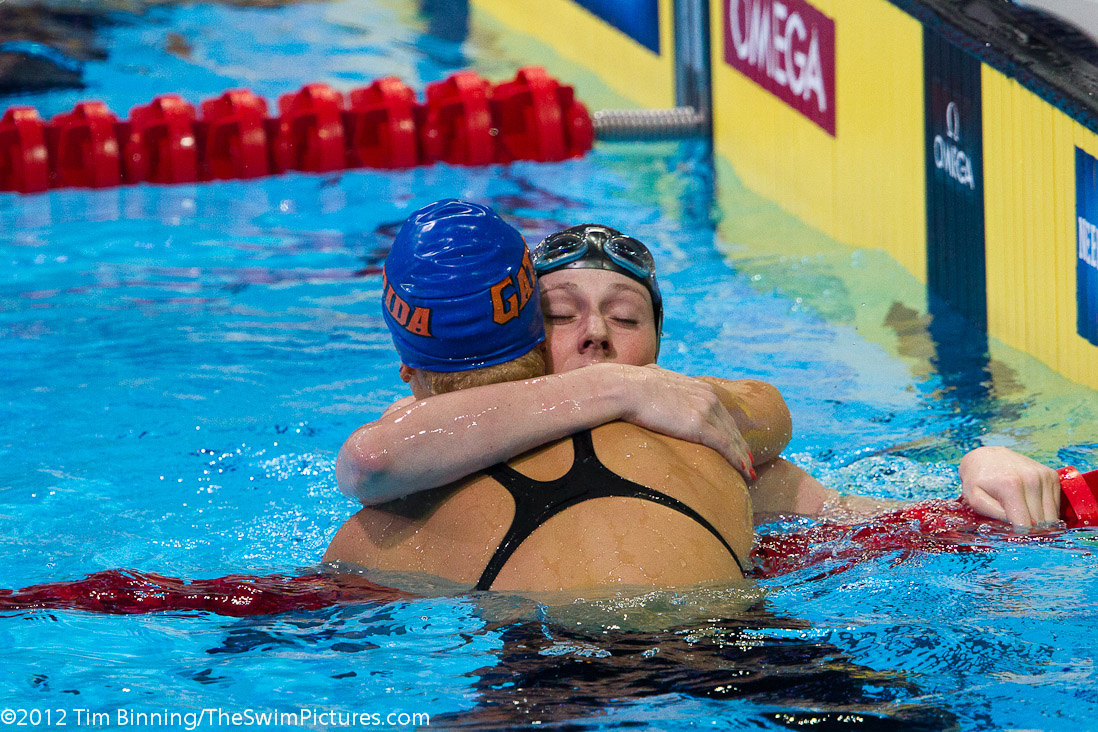 Missy Franklin of the Colorado Stars congratulates Elizabeth Beisel following the 200 back semi-final. The two qualified first and second for the final.